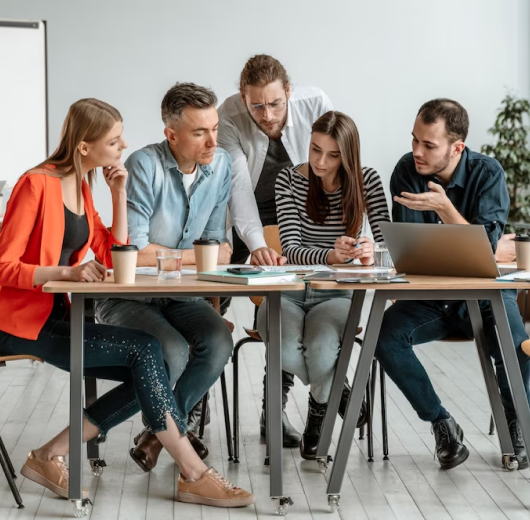 people discussing in office